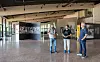 Per Øyvind Riise, Eli Haugen Rødsdalen og Geir Ove Andreassen i et av utstillingslokalene på det nye museet. - I anledning åpningen har vi satt sammen en variert fotoutstilling som vises her, forteller de tre.